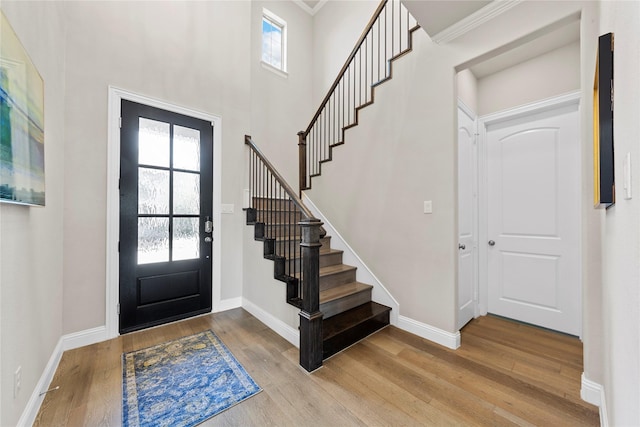 1608 Coventry Ct, Farmers Branch, TX 75234 - entrance foyer featuring stairway, wood finished floors, healthy amount of natural light, and a towering ceiling