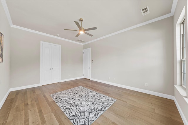 1608 Coventry Ct, Farmers Branch, TX 75234 - unfurnished room featuring wood finished floors, a ceiling fan, baseboards, and crown molding