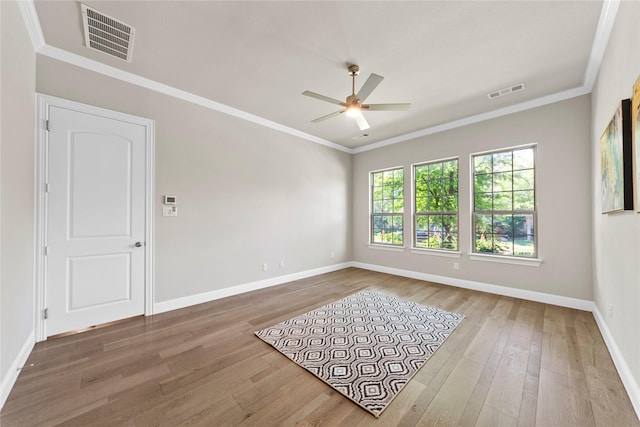 1608 Coventry Ct, Farmers Branch, TX 75234 - unfurnished room featuring ceiling fan, wood finished floors, baseboards, and crown molding