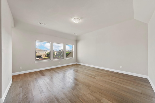 1608 Coventry Ct, Farmers Branch, TX 75234 - empty room featuring baseboards and hardwood / wood-style floors