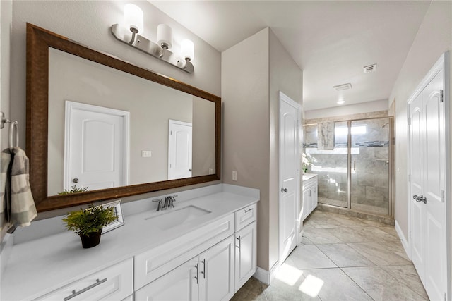 1608 Coventry Ct, Farmers Branch, TX 75234 - bathroom with vanity, a stall shower, and baseboards