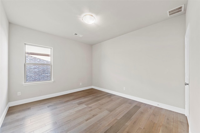 1608 Coventry Ct, Farmers Branch, TX 75234 - unfurnished room featuring light wood-type flooring and baseboards