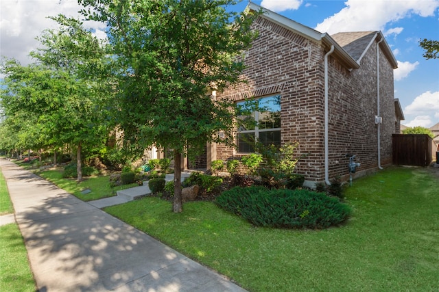 1608 Coventry Ct, Farmers Branch, TX 75234 - view of front of house featuring brick siding and a front yard