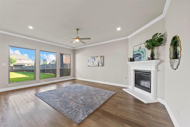 1608 Coventry Ct, Farmers Branch, TX 75234 - living area with ceiling fan, dark wood-style floors, a glass covered fireplace, ornamental molding, and baseboards