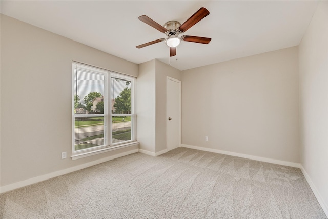 1305 Willow Way, Garland, TX 75043 - carpeted spare room with baseboards and a ceiling fan