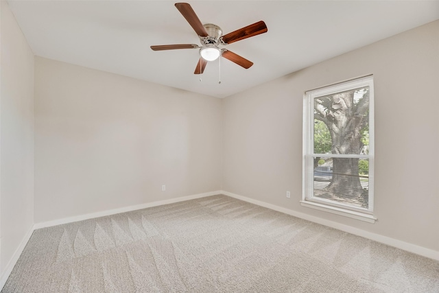 1305 Willow Way, Garland, TX 75043 - carpeted spare room with baseboards and a ceiling fan
