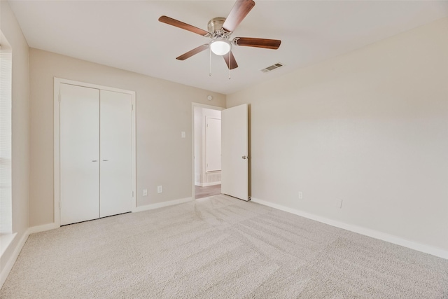 1305 Willow Way, Garland, TX 75043 - unfurnished bedroom with carpet flooring, baseboards, a closet, and ceiling fan