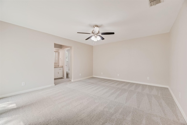 1305 Willow Way, Garland, TX 75043 - unfurnished room with a ceiling fan, light colored carpet, and baseboards