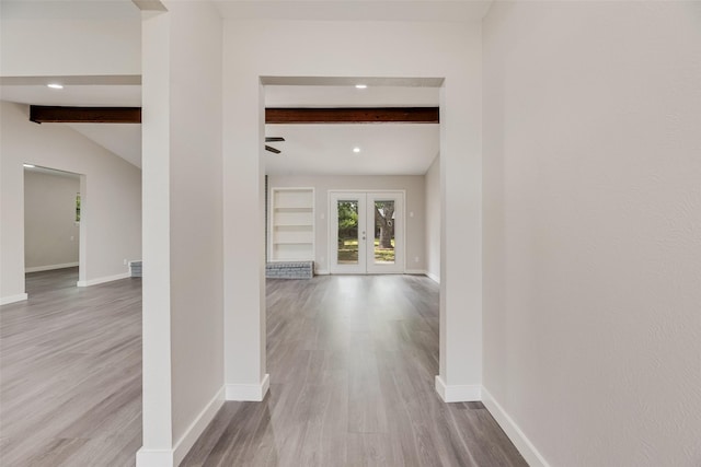 1305 Willow Way, Garland, TX 75043 - hallway featuring beam ceiling, wood finished floors, recessed lighting, and french doors