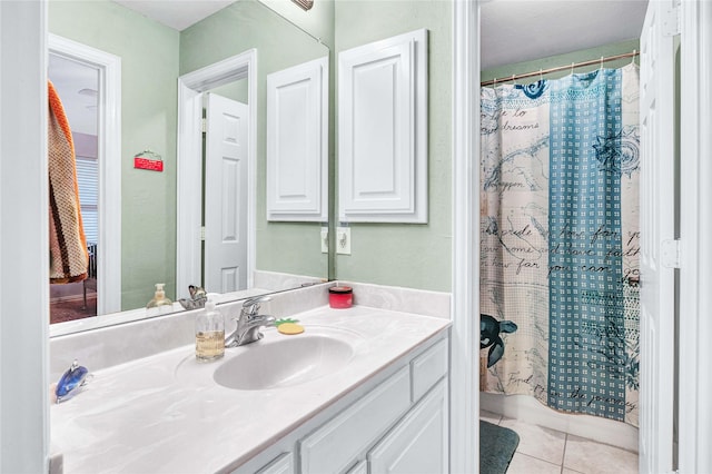 11086 Tenison Ln, Frisco, TX 75033 - bathroom with tile patterned floors, vanity, and a shower with curtain