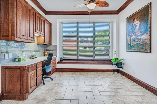 11086 Tenison Ln, Frisco, TX 75033 - office featuring built in study area, ceiling fan, baseboards, and ornamental molding