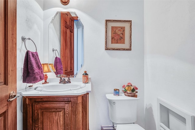 11086 Tenison Ln, Frisco, TX 75033 - half bathroom with vanity and toilet