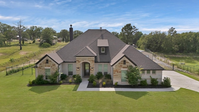 149 Deats Farm Ct, Azle, TX 76020 - french country inspired facade featuring stone siding, a shingled roof, and concrete driveway