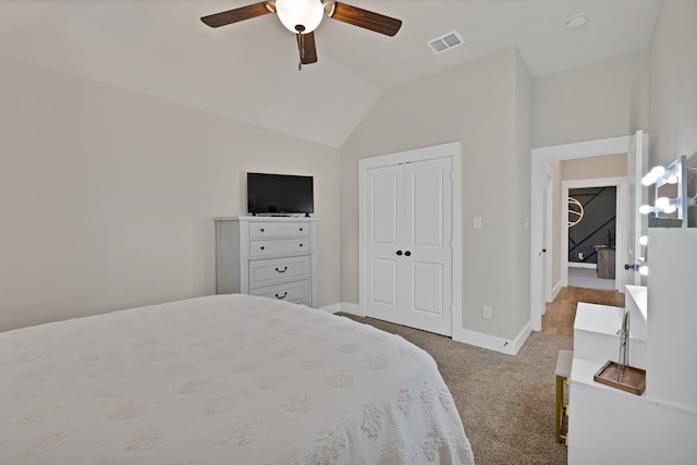 149 Deats Farm Ct, Azle, TX 76020 - bedroom featuring carpet, lofted ceiling, a closet, baseboards, and a ceiling fan