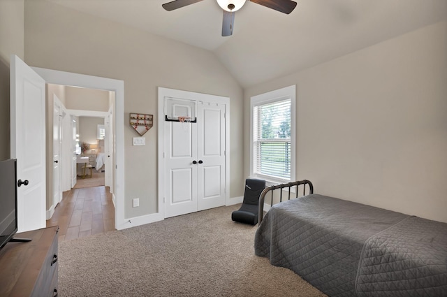 149 Deats Farm Ct, Azle, TX 76020 - carpeted bedroom featuring vaulted ceiling, ceiling fan, a closet, and baseboards