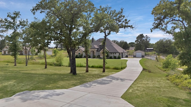 149 Deats Farm Ct, Azle, TX 76020 - view of property's community featuring a yard and a garage