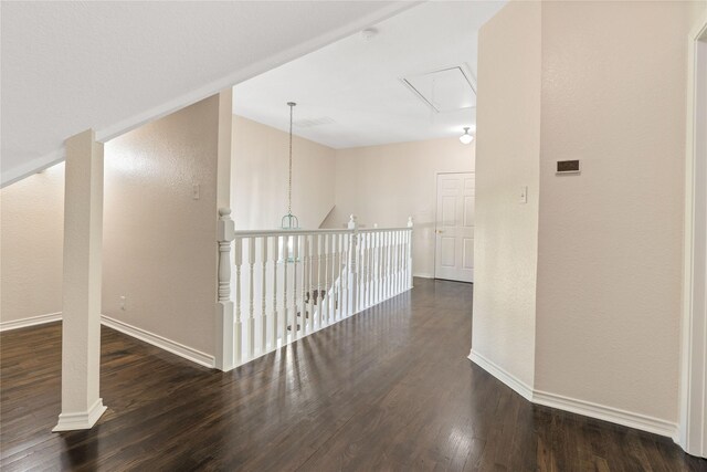 561 Farms Rd, New Hope, TX 75071 - hallway with attic access, wood finished floors, baseboards, and a textured wall