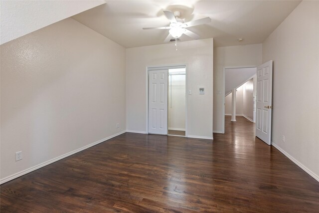 561 Farms Rd, New Hope, TX 75071 - unfurnished bedroom featuring dark wood finished floors, baseboards, and ceiling fan