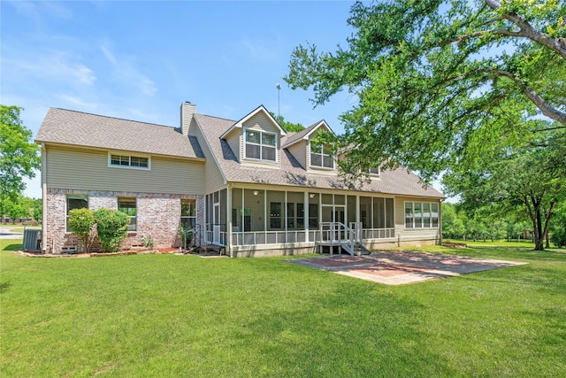 561 Farms Rd, New Hope, TX 75071 - back of property featuring a sunroom, a lawn, a patio area, a chimney, and brick siding