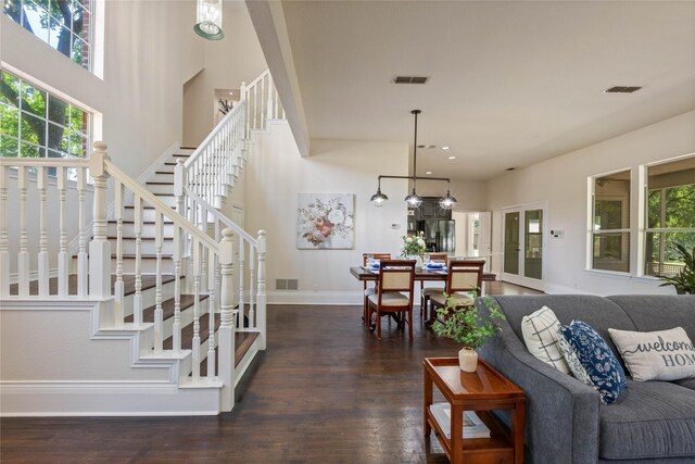 561 Farms Rd, New Hope, TX 75071 - living room featuring baseboards, dark wood-style floors, and stairway