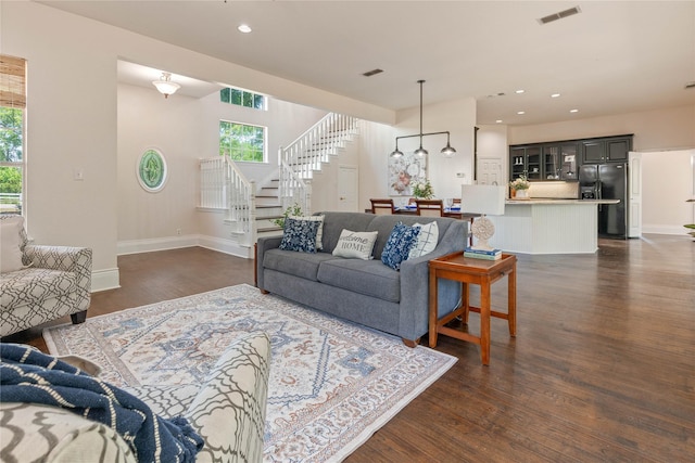 561 Farms Rd, New Hope, TX 75071 - living room with stairs, dark wood-type flooring, baseboards, and recessed lighting