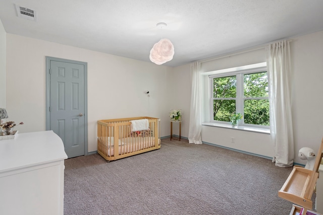 201 Forest Trce, Rockwall, TX 75087 - bedroom with carpet floors and a nursery area