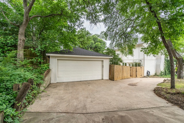 201 Forest Trce, Rockwall, TX 75087 - detached garage featuring fence