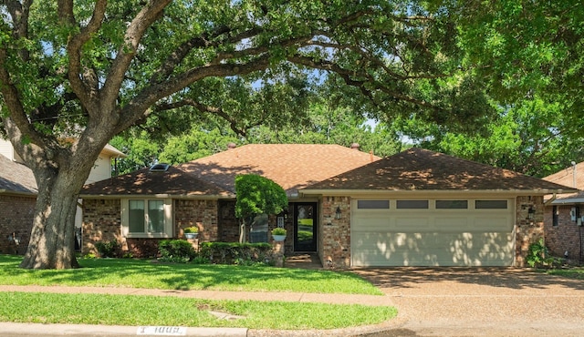 1009 Windmill Ln, Irving, TX 75061 - single story home featuring concrete driveway, a garage, brick siding, a front lawn, and a shingled roof