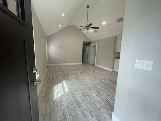 1315 W Gandy St, Denison, TX 75020 - unfurnished living room featuring a ceiling fan, light wood-style flooring, baseboards, high vaulted ceiling, and recessed lighting