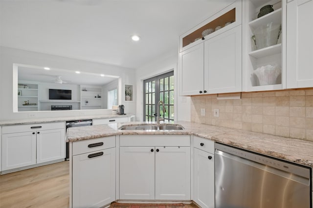 2006 Country Oaks Dr, Garland, TX 75040 - kitchen with dishwasher, a peninsula, white cabinetry, glass insert cabinets, and recessed lighting