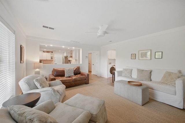 2006 Country Oaks Dr, Garland, TX 75040 - living area with washer / dryer and a ceiling fan