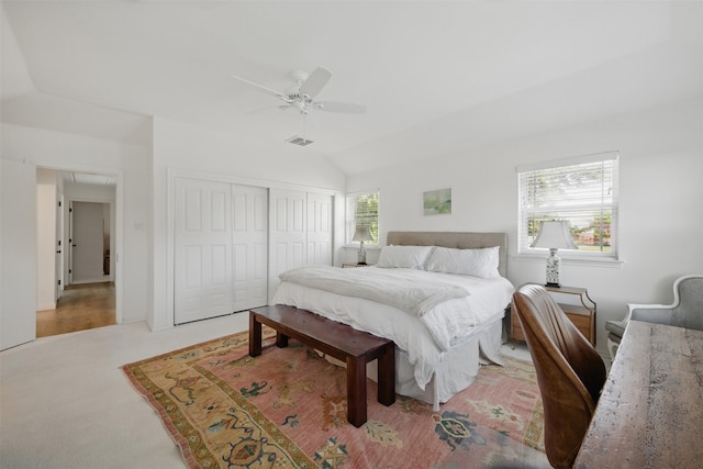 2006 Country Oaks Dr, Garland, TX 75040 - carpeted bedroom with vaulted ceiling, a closet, and ceiling fan