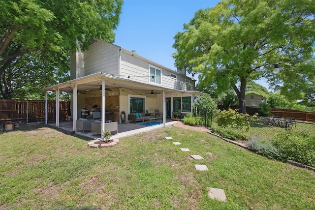 2006 Country Oaks Dr, Garland, TX 75040 - rear view of house featuring a ceiling fan, outdoor lounge area, a fenced backyard, and a patio