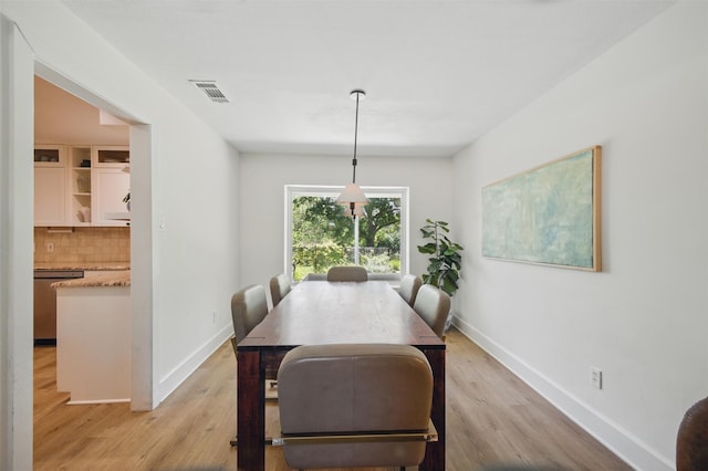 2006 Country Oaks Dr, Garland, TX 75040 - dining space featuring light wood finished floors and baseboards