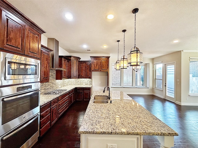 3037 Crestwater Rdg, Keller, TX 76248 - kitchen featuring a sink, appliances with stainless steel finishes, wall chimney exhaust hood, dark wood finished floors, and backsplash