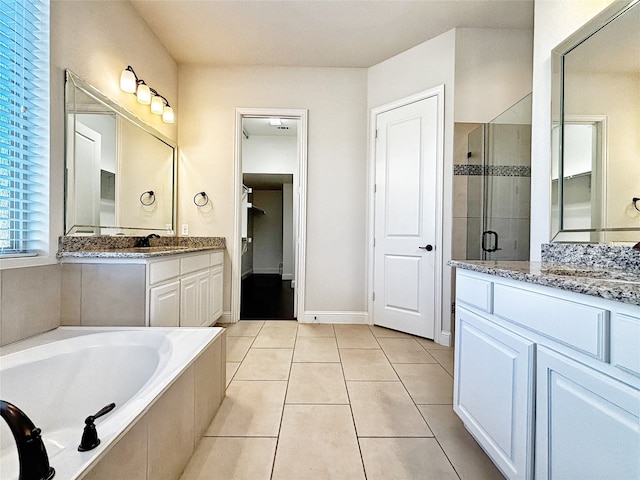 3037 Crestwater Rdg, Keller, TX 76248 - bathroom with a stall shower, a garden tub, tile patterned flooring, two vanities, and baseboards