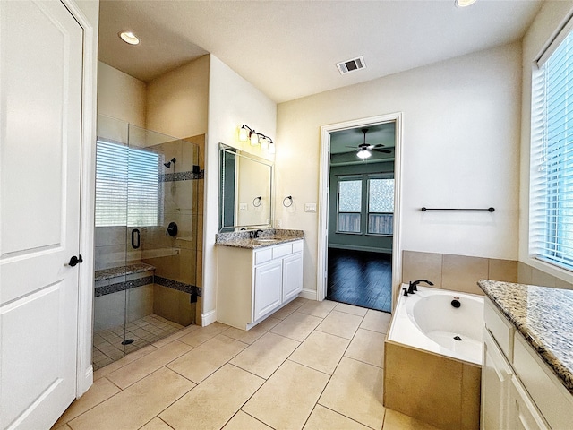 3037 Crestwater Rdg, Keller, TX 76248 - full bath featuring a stall shower, vanity, ceiling fan, tile patterned flooring, and recessed lighting