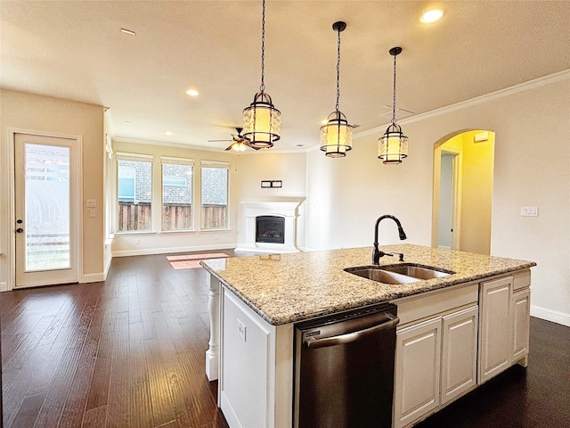 3037 Crestwater Rdg, Keller, TX 76248 - kitchen with dishwasher, a sink, arched walkways, a center island with sink, and baseboards