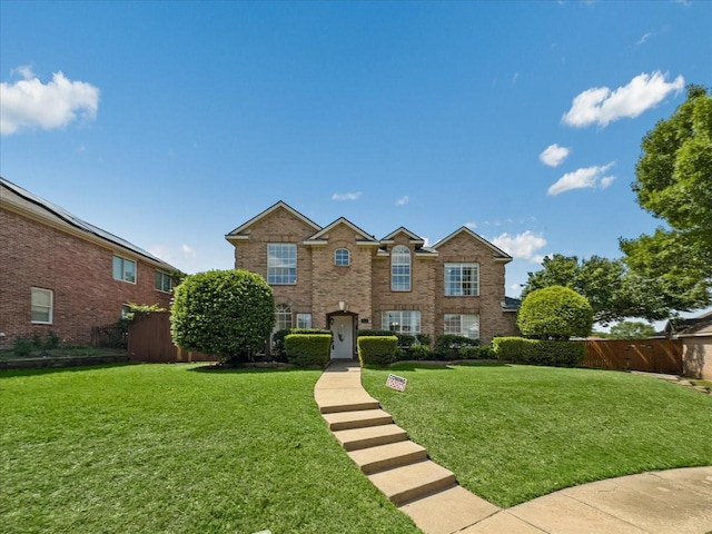 view of front of home with brick siding