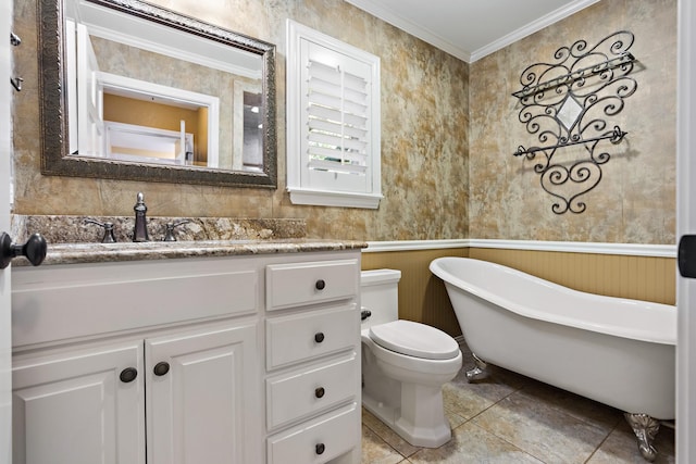3740 Chimney Ridge Dr, Waco, TX 76708 - full bath featuring a freestanding bath, crown molding, vanity, toilet, and tile patterned floors