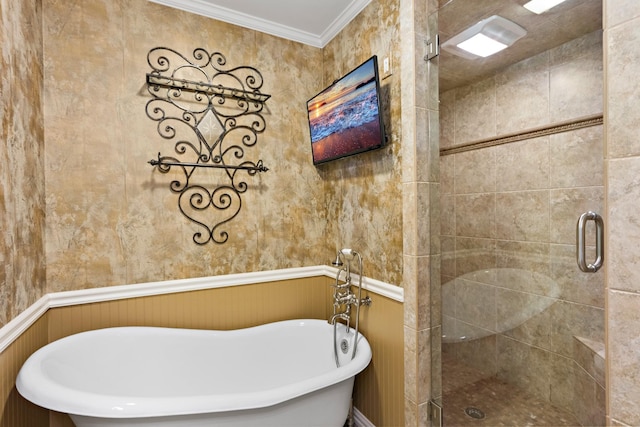 3740 Chimney Ridge Dr, Waco, TX 76708 - full bath with a stall shower, crown molding, a soaking tub, and a wainscoted wall