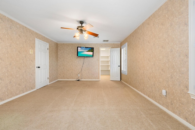 3740 Chimney Ridge Dr, Waco, TX 76708 - unfurnished room with ornamental molding, ceiling fan, carpet, baseboards, and wallpapered walls