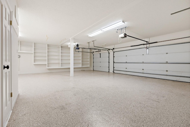 3740 Chimney Ridge Dr, Waco, TX 76708 - garage with a garage door opener and baseboards
