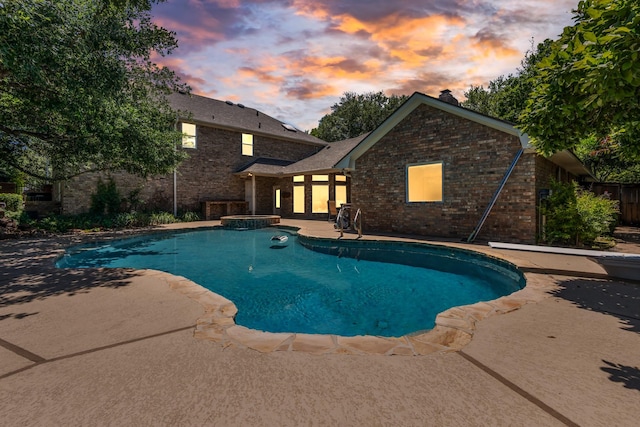 3740 Chimney Ridge Dr, Waco, TX 76708 - view of swimming pool with a patio area and a pool with connected hot tub