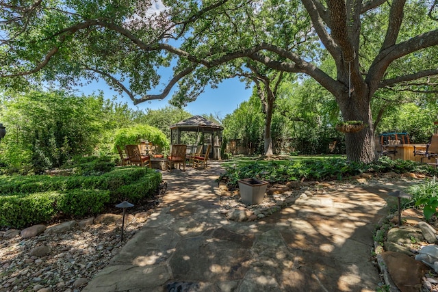 3740 Chimney Ridge Dr, Waco, TX 76708 - surrounding community with a gazebo, a patio, and fence