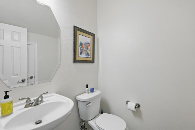 1601 Manchester Way, Corinth, TX 76210 - bathroom featuring a sink and toilet
