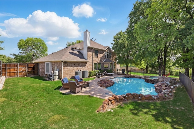1601 Manchester Way, Corinth, TX 76210 - view of pool featuring a patio area, a pool with connected hot tub, and central AC