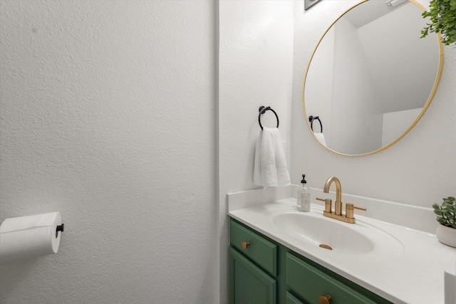 6612 Oldgate Ln, Arlington, TX 76002 - bathroom featuring vanity and a textured wall