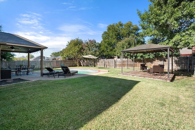 6612 Oldgate Ln, Arlington, TX 76002 - view of yard featuring a gazebo, a patio, a wooden deck, ceiling fan, and an outdoor hangout area