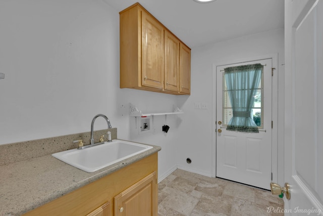1403 Whispering Pines Dr, Minden, LA 71055 - laundry room featuring washer hookup, cabinet space, baseboards, and light stone finish floors
